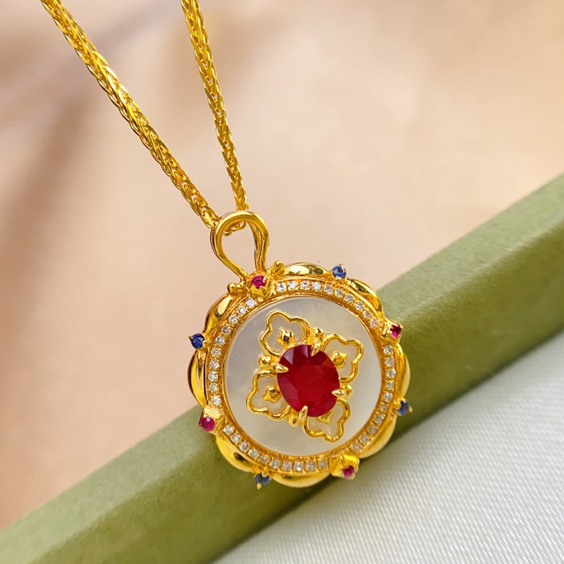 14k Gold 0.48 Ct Natural Ruby & Diamond Pendant( Without Chain ): Ref:231094131 // gold content:14k gold // main gemstone:ruby // shape:oval // carat weight:0. 48ct // color:red // treatment:natural // // adjacent gemstone 2 : diamond // number of stones:40 //