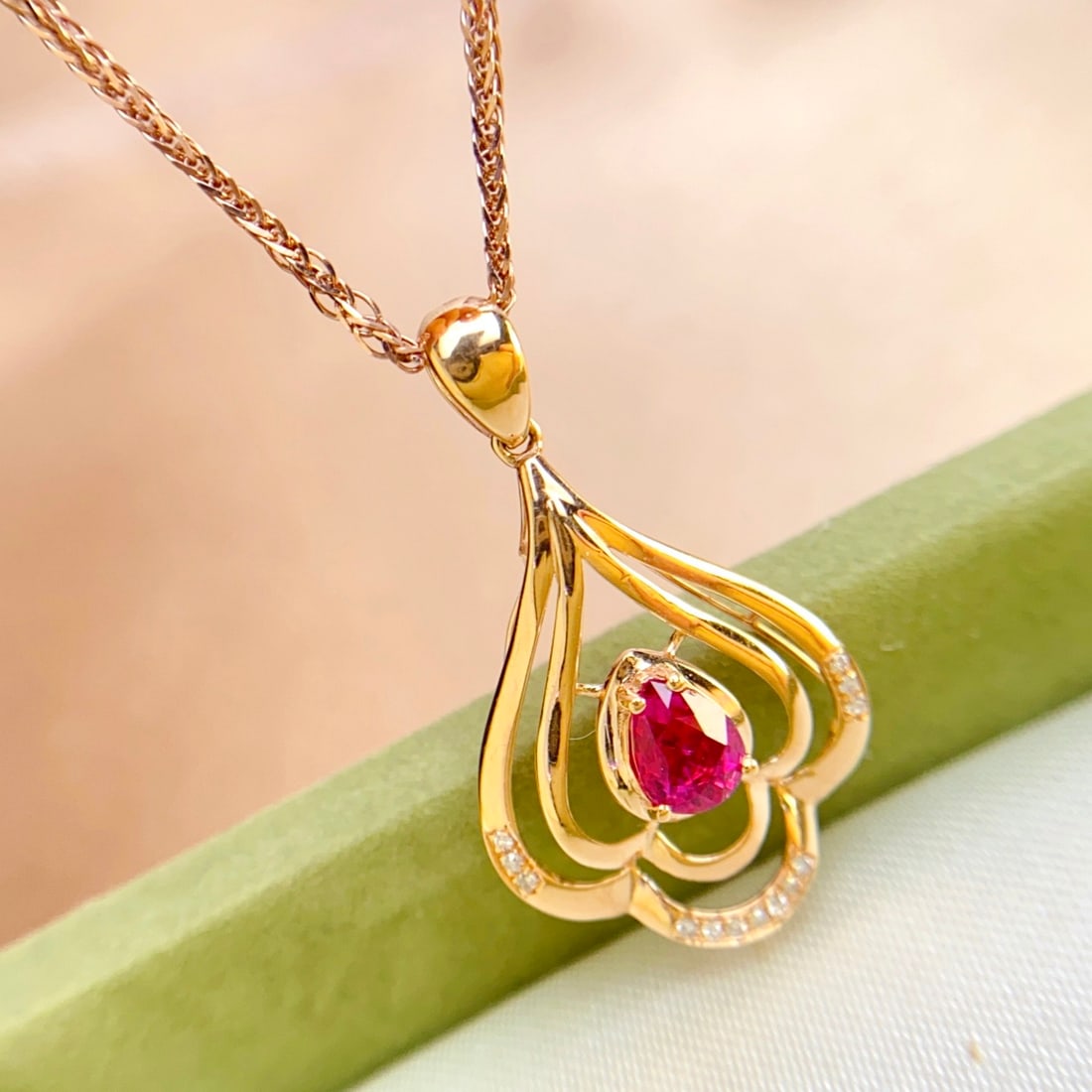 14k Gold 0.55 Ct Natural Ruby & Diamond Pendant( Without Chain ): Ref:231094144 // gold content:14k gold // main gemstone:ruby // shape:pear // carat weight:0. 55ct // color:red // treatment:natural // // adjacent gemstone 2 : diamond // number of stones:13 //