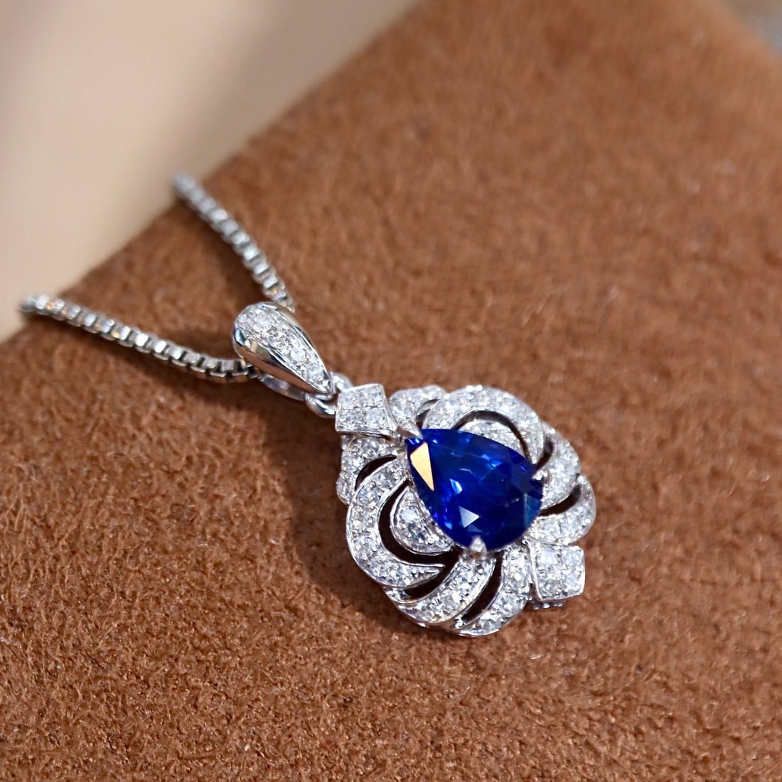 14k Gold 0.69 Ctw Natural Sapphire & Diamond Pendant( Without Chain ): Ref:231094165 // gold content:14k gold // main gemstone:sapphire // shape:pear // carat weight:0. 58ct // color:blue // treatment:natural // // adjacent gemstone 2 : diamond // shape:round // carat