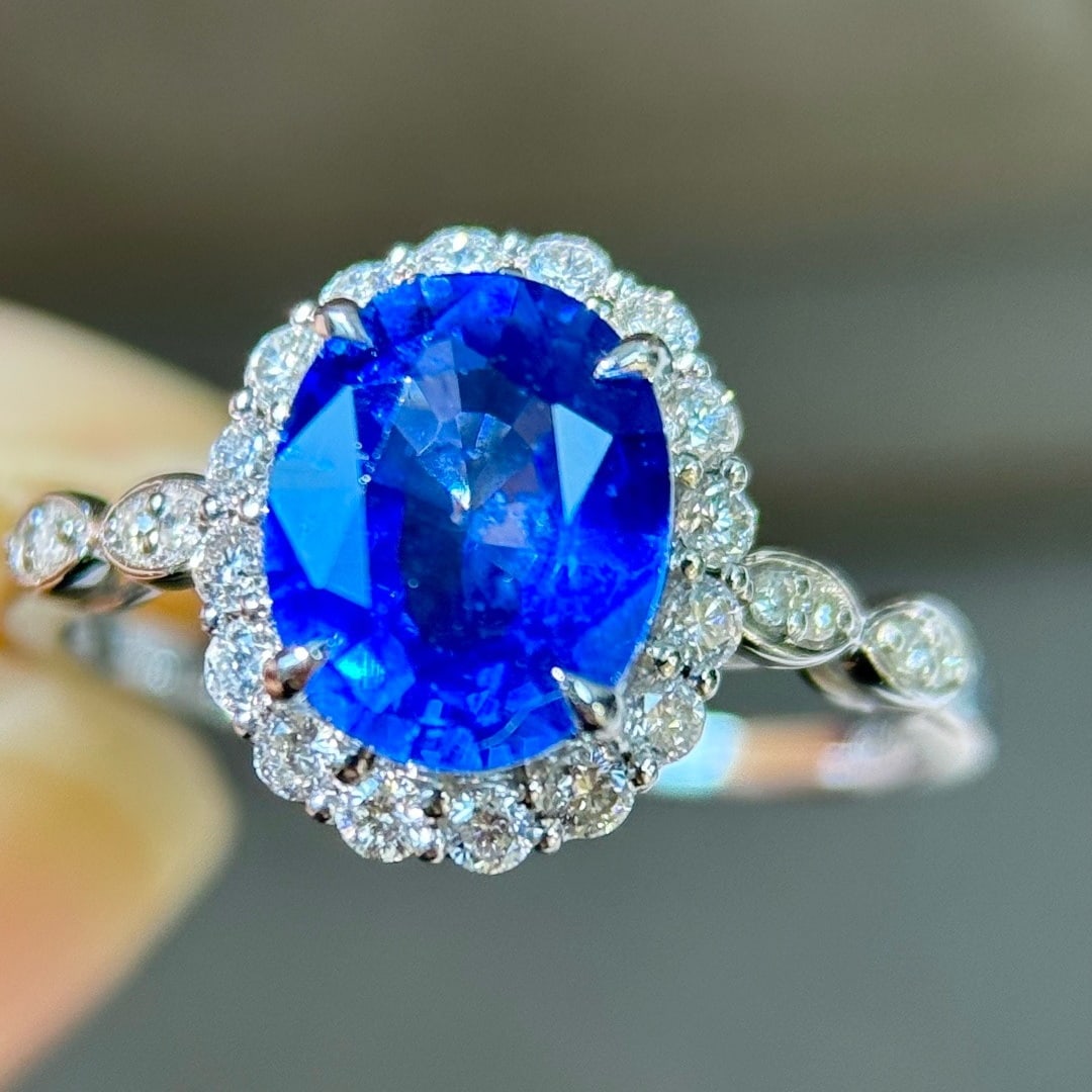 14k Gold 2.51 Ctw Natural Sapphire & Diamond Ring: Ref:231094182 // gold content:14k gold // ring size:7. 25us // // main gemstone:sapphire // shape:oval // carat weight:2. 15ct // color:cornflower blue // treatment:natural // // adjacent gemstone 2 :