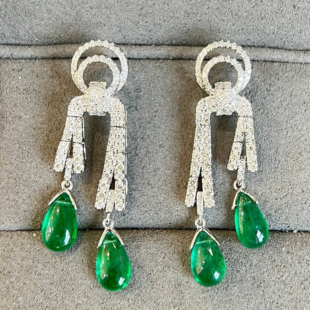 14k Gold 4.77 Ctw Vivid Green Natural Emerald & Diamond Earrings: Ref:231094201 // gold content:14k gold // main gemstone:emerald // shape:pear // carat weight:3. 88ct // color:vivid green // treatment:natural // // adjacent gemstone 2 : diamond // shape:round // ca