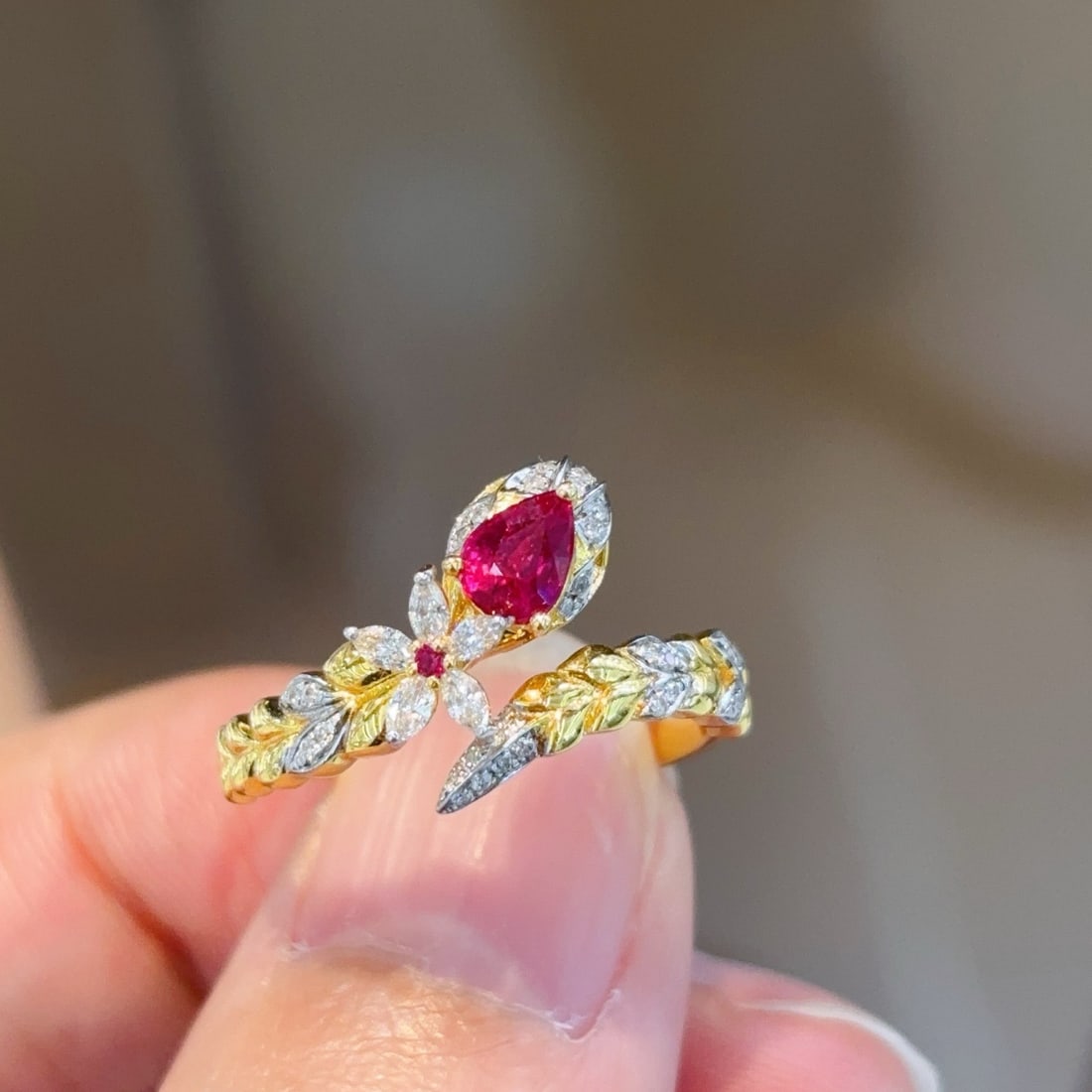 14k Gold 0.45 Ct Natural Ruby & Diamond Ring: Ref:231094205 // gold content:14k gold // ring size:7. 25us // // main gemstone:ruby // shape:pear // carat weight:0. 45ct // color:red // treatment:natural // // adjacent gemstone 2 : diamond //