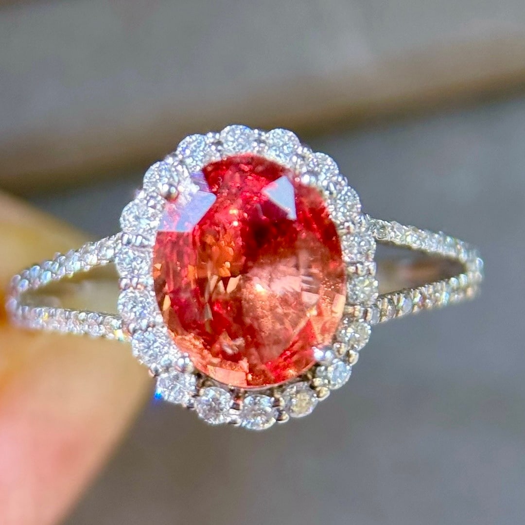 14k Gold 2.29 Ctw Natural Padparadscha Sapphire & Diamond Ring: Ref:231094208 // gold content:14k gold // ring size:7. 25us // // main gemstone:padparadscha sapphire // shape:oval // carat weight:1. 83ct // color:pinkish orange // treatment:natural // // adjacent