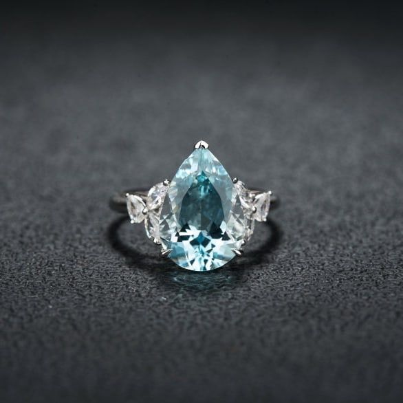 14k Gold 4.71 Ctw Natural Aquamarine & Sapphire Ring: Ref:231094249 // gold content:14k gold // ring size:7. 25us // // main gemstone:aquamarine // shape:pear // carat weight:4. 27ct // color:santa maria color // treatment:natural // // adjacent