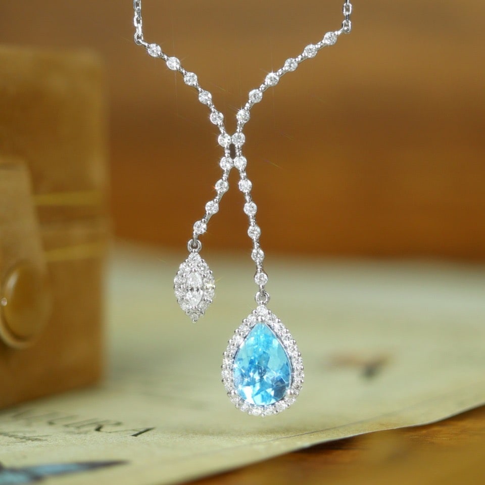 14k Gold 2.16 Ctw Natural Aquamarine & Diamond Necklace: Ref:231094300 // gold content:14k gold // main gemstone:aquamarine // shape:pear // carat weight:1. 46ct // color:blue // treatment:natural // // adjacent gemstone 2 : diamond // shape:multiple //