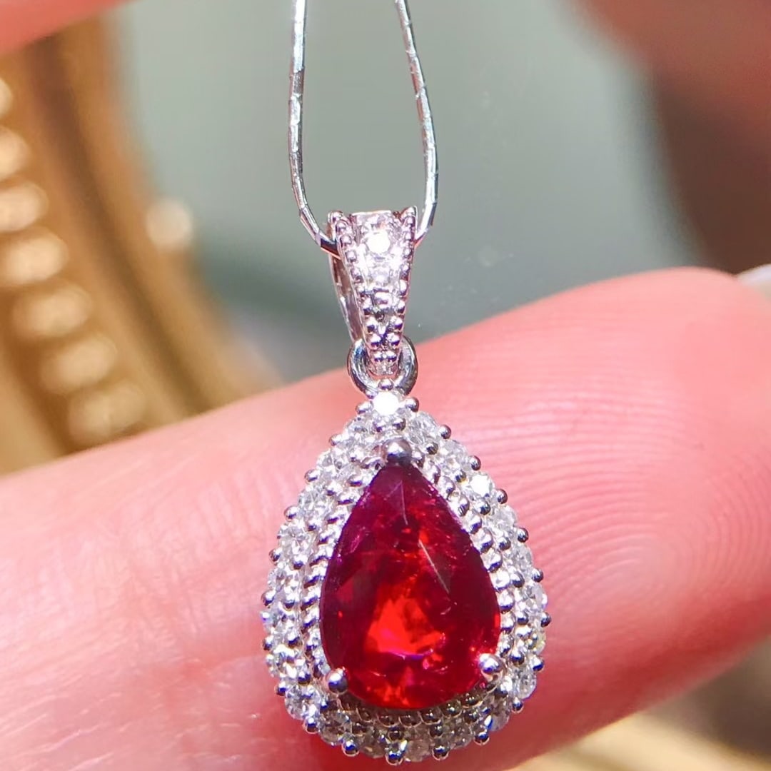 14k Gold 0.88 Ctw Natural Ruby & Diamond Pendant( Without Chain ): Ref:231094446 // gold content:14k gold // main gemstone:ruby // shape:pear // carat weight:0. 7ct // color:pigeonblood red // treatment:natural // // adjacent gemstone 2 : diamond // shape:round //