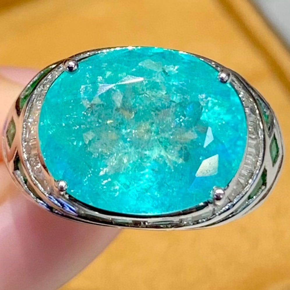 14k Gold 6.88 Ct Natural Paraiba Tourmaline & Diamond Ring: Ref:231095088 // gold content:14k gold // ring size:7. 25us // // main gemstone:paraiba tourmaline // shape:oval // carat weight:6. 88ct // color:blue // treatment:natural // // adjacent gemstone 2 : 