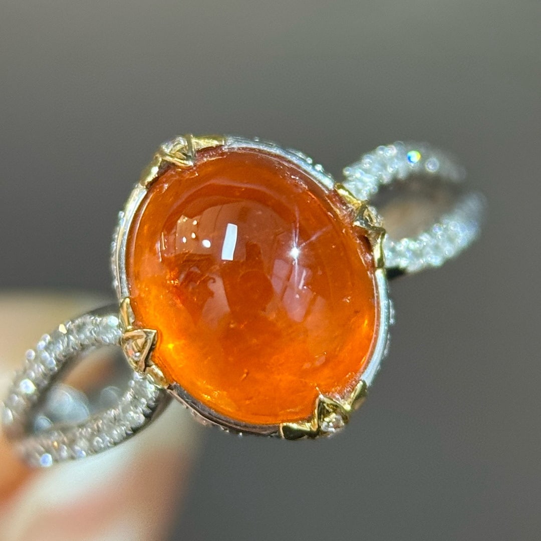 14k Gold 4.66 Ctw Natural Spessartine & Diamond Ring: Ref:231095094 // gold content:14k gold // ring size:7. 25us // // main gemstone:spessartine // shape:oval // carat weight:4. 36ct // color:orange // treatment:natural // // adjacent gemstone 2 :