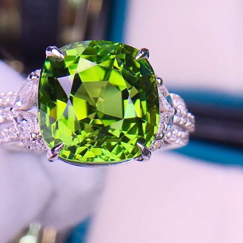 14k Gold 7.1 Ct Natural Tourmaline & Diamond Ring: Ref:231095174 // gold content:14k gold // ring size:7. 25us // // main gemstone:tourmaline // shape:cushion // carat weight:7. 1ct // color:green // treatment:natural // // adjacent gemstone 2 : diamo