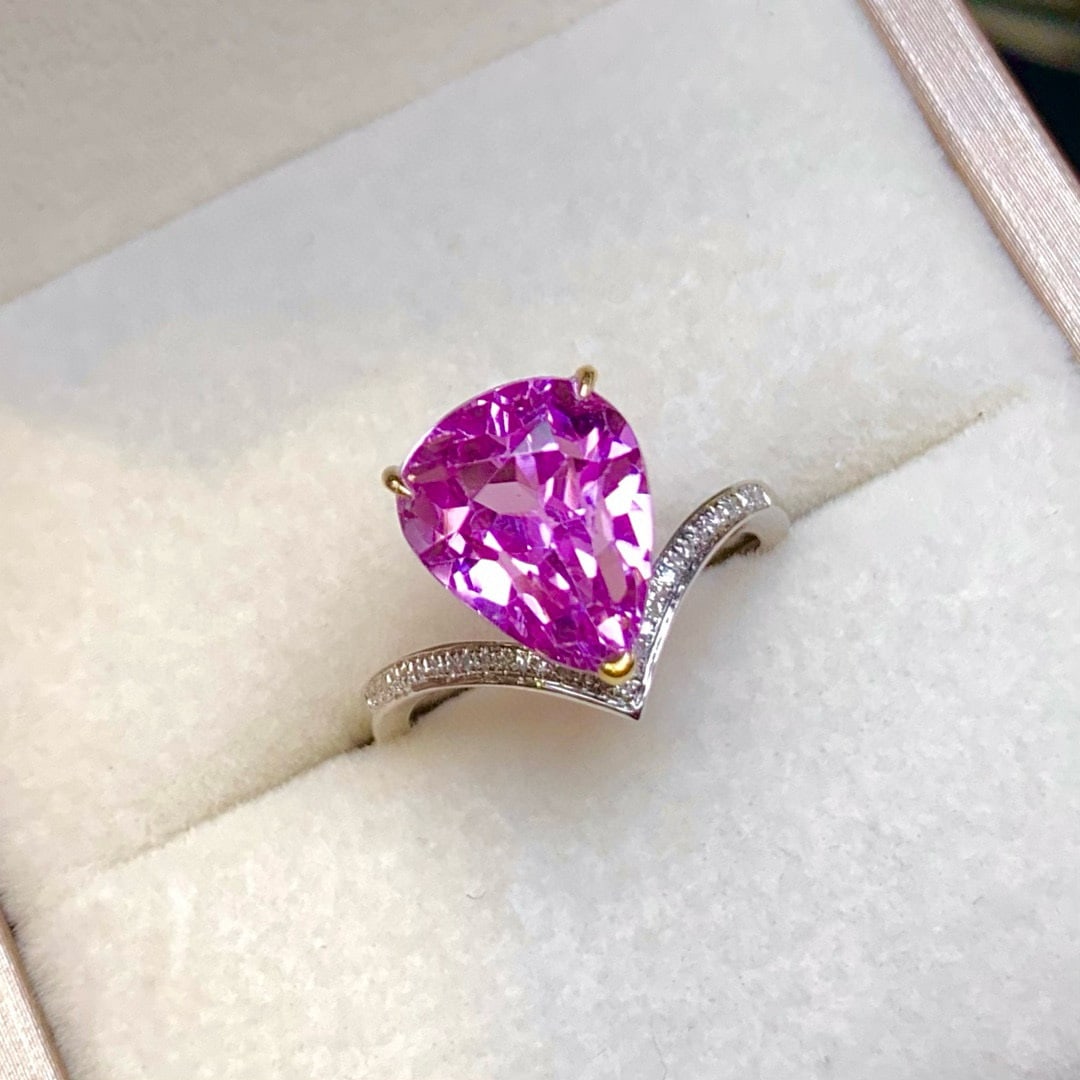 14k Gold 6.5 Ct Natural Kunzite & Diamond Ring: Ref:231095247 // gold content:14k gold // ring size:7. 25us // // main gemstone:kunzite // shape:pear // carat weight:6. 5ct // color:purple // treatment:natural // // adjacent gemstone 2 : diamond