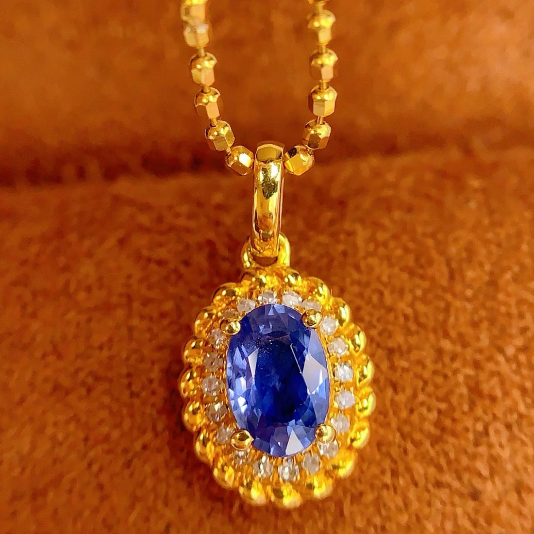14k Gold 0.8 Ct Natural Sapphire & Diamond Pendant( Without Chain ): Ref:231096188 // gold content:14k gold // main gemstone:sapphire // shape:oval // carat weight:0. 8ct // color:blue // treatment:natural // // adjacent gemstone 2 : diamond // number of stones:20 //
