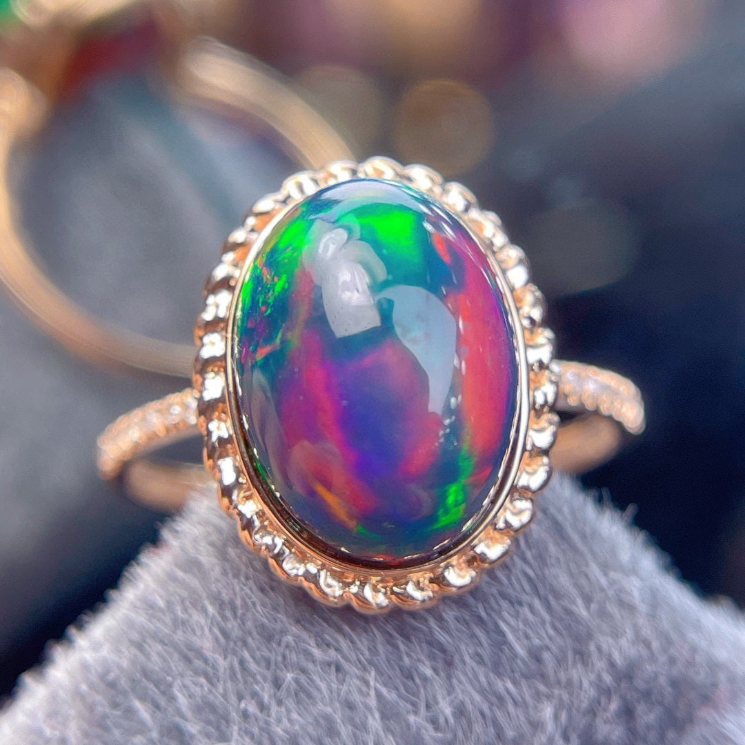 14k Gold 4.4 Ct Natural Opal & Diamond Ring: Ref:231096291 // gold content:14k gold // ring size:7. 25us // // main gemstone:opal // shape:oval // carat weight:4. 4ct // color:color // treatment:natural // // adjacent gemstone 2 : diamond // sha
