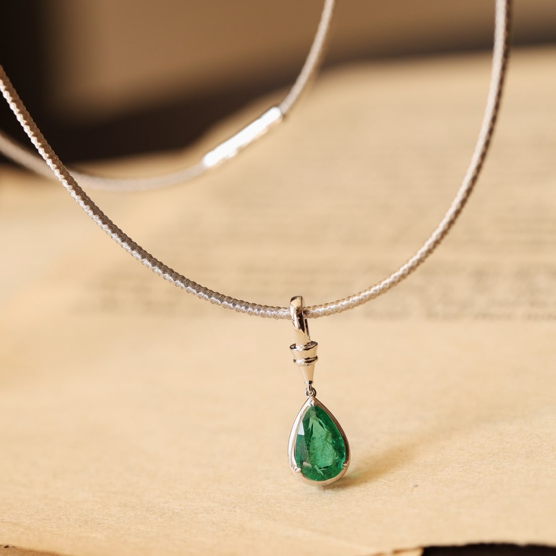 14k Gold 1.18 Ct Natural Emerald Necklace: Ref:231096329 // gold content:14k gold // main gemstone:emerald // shape:pear // carat weight:1. 18ct // color:green // treatment:natural // Condition: New Low Estimate: 6200 High Estimate: 9200