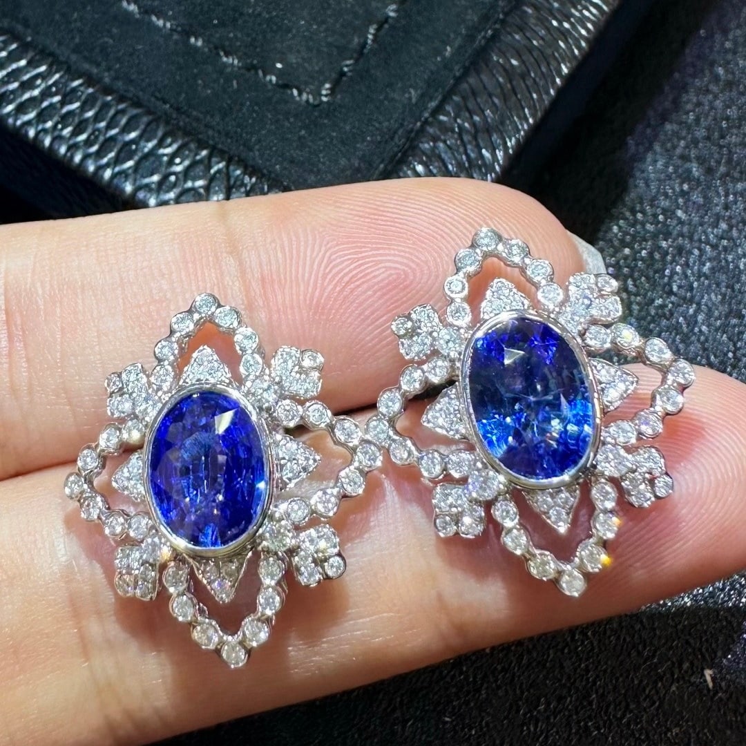 14k Gold 3.97 Ctw Natural Sapphire & Diamond Earrings: Ref:231096344 // gold content:14k gold // main gemstone:sapphire // shape:oval // carat weight:3. 23ct // color:blue // treatment:natural // // adjacent gemstone 2 : diamond // shape:round // carat we
