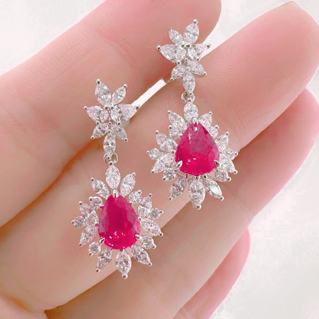14k Gold 4.54 Ctw Natural Sapphire & Diamond Earrings: Ref:231096361 // gold content:14k gold // main gemstone:sapphire // shape:pear // carat weight:2. 65ct // color:pink // treatment:natural // // adjacent gemstone 2 : diamond // shape:multiple //