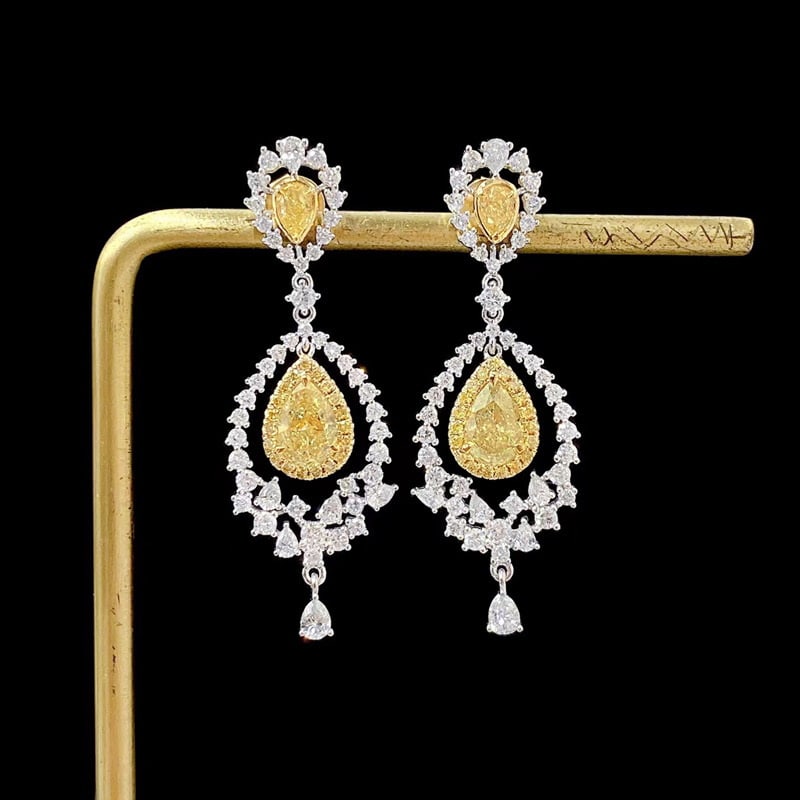 14k Gold 2.63 Ctw Natural Yellow Diamond & Diamond Earrings: Ref:231097036 // gold content:14k gold // main gemstone:yellow diamond // shape:pear // carat weight:1. 27ct // color:yellow // treatment:natural // // adjacent gemstone 2 : diamond // shape:multiple 