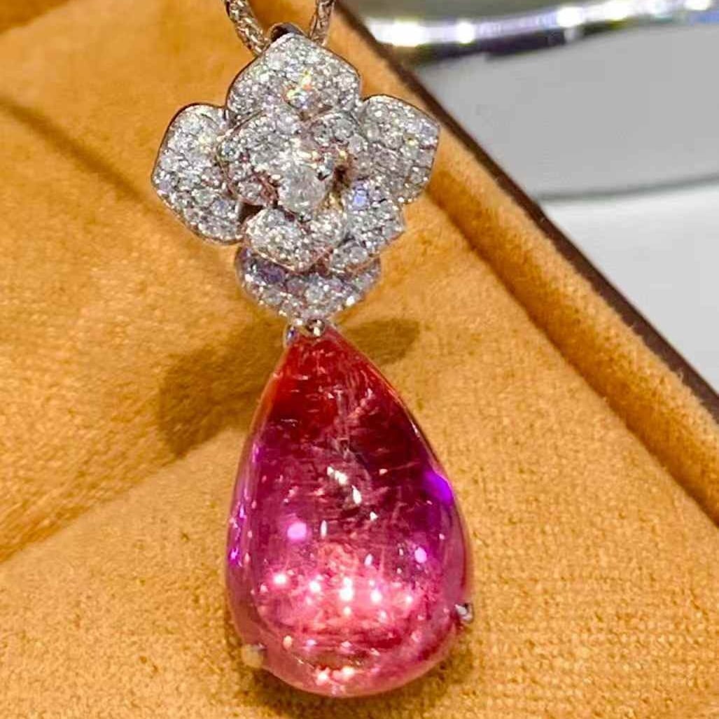 14k Gold 6.8 Ct Natural Tourmaline & Diamond Pendant( Without Chain ): Ref:231097179 // gold content:14k gold // main gemstone:tourmaline // shape:pear // carat weight:6. 8ct // color:red // treatment:natural // // adjacent gemstone 2 : diamond // shape:round // clarity