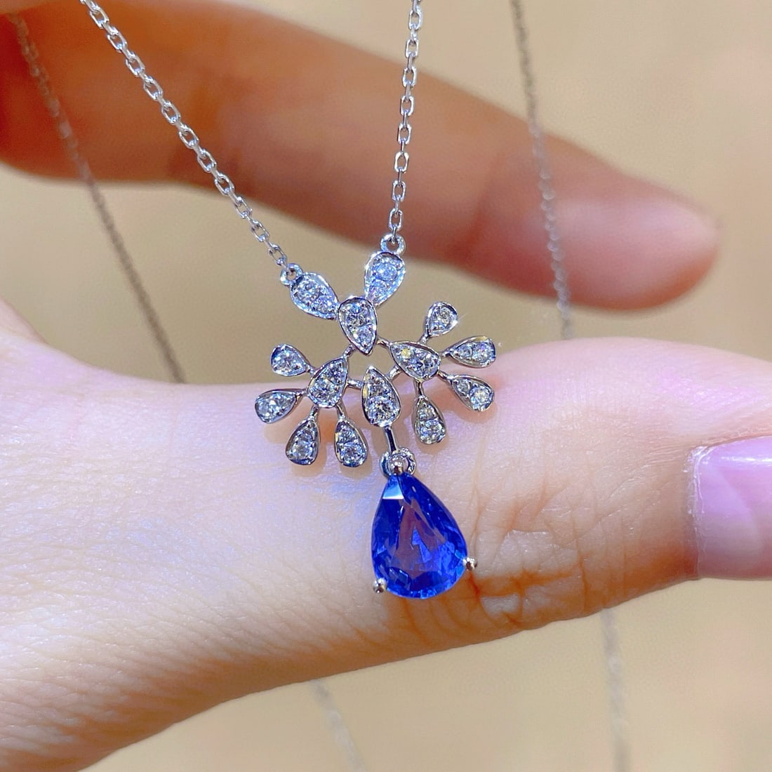 14k Gold 1.31 Ctw Natural Sapphire & Diamond Necklace: Ref:231097228 // gold content:14k gold // main gemstone:sapphire // shape:pear // carat weight:1. 13ct // color:blue // treatment:natural // // adjacent gemstone 2 : diamond // shape:round // carat