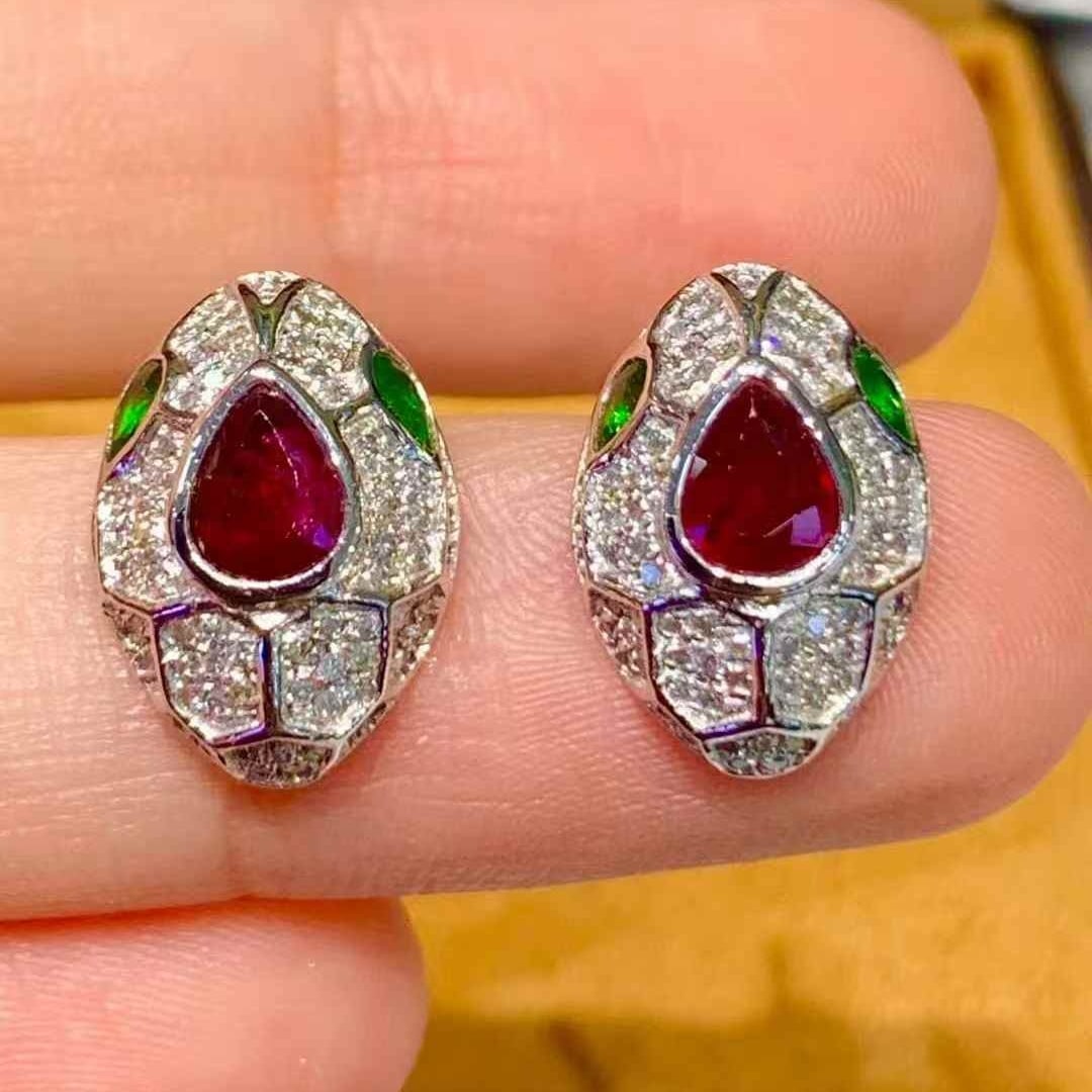 14k Gold 1.2 Ct Natural Ruby & Diamond Earrings: Ref:231097237 // gold content:14k gold // main gemstone:ruby // shape:pear // carat weight:1. 2ct // color:pigeonblood red // treatment:natural // // adjacent gemstone 2 : diamond // shape:round //