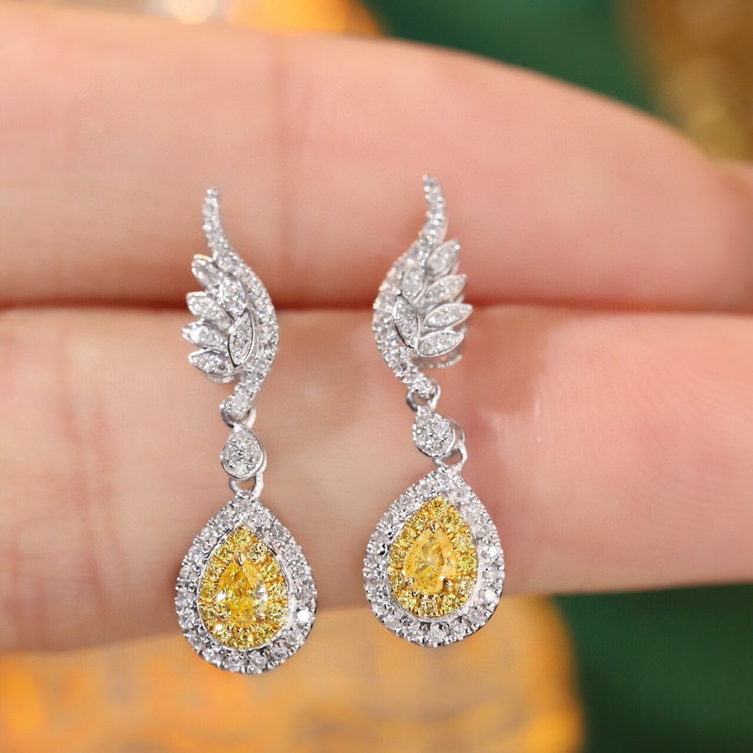 14k Gold 0.60 Ctw Natural Yellow Diamond & Diamond Earrings: Ref:231097247 // gold content:14k gold // main gemstone:yellow diamond // shape:pear // carat weight:0. 18ct // color:yellow // treatment:natural // // adjacent gemstone 2 : diamond // shape:round // 