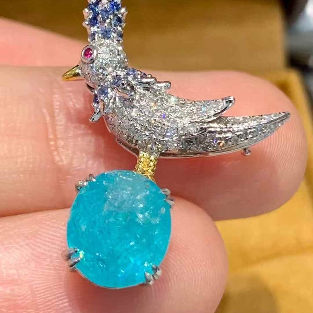 14k Gold 3.2 Ct Natural Paraiba Tourmaline & Diamond Brooch/pendant( Without Chain ): Ref:231097259 // gold content:14k gold // main gemstone:paraiba tourmaline // shape:oval // carat weight:3. 2ct // color:blue // treatment:natural // // adjacent gemstone 2 : diamond // shape:round