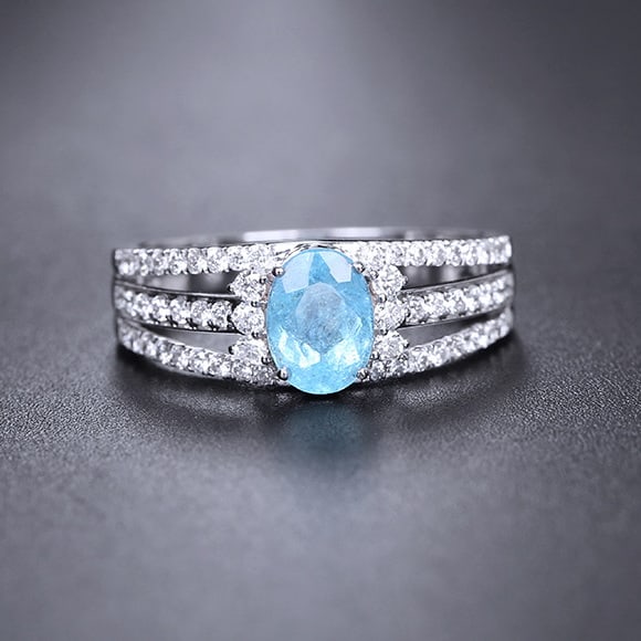 14k Gold 1.28 Ctw Natural Paraiba Tourmaline & Diamond Ring: Ref:231098006 // gold content:14k gold // ring size:7. 25us // // main gemstone:paraiba tourmaline // shape:oval // carat weight:0. 86ct // color:blue // treatment:natural // // adjacent gemstone 2 :