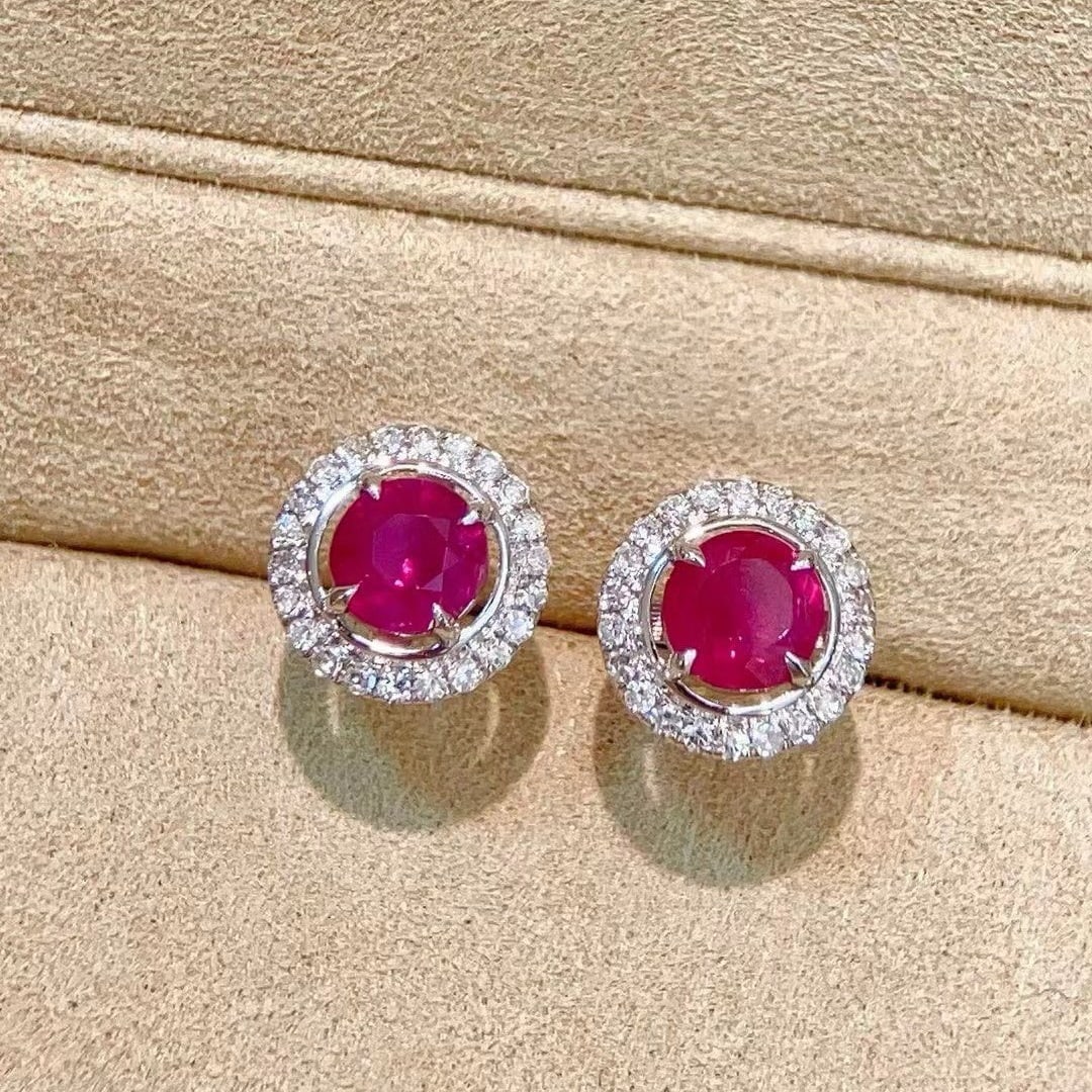 14k Gold 1.28 Ctw Natural Ruby & Diamond Earrings: Ref:231098141 // gold content:14k gold // main gemstone:ruby // shape:round // carat weight:1. 06ct // color:red // treatment:natural // cut grade:g // // adjacent gemstone 2 : diamond // shape:round