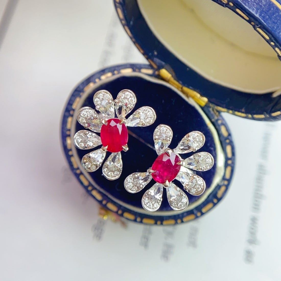 14k Gold 1.03 Ct Natural Ruby & Diamond Earrings: Ref:231098155 // gold content:14k gold // main gemstone:ruby // shape:oval // carat weight:1. 03ct // color:red // treatment:natural // // adjacent gemstone 2 : diamond // number of stones:56 //