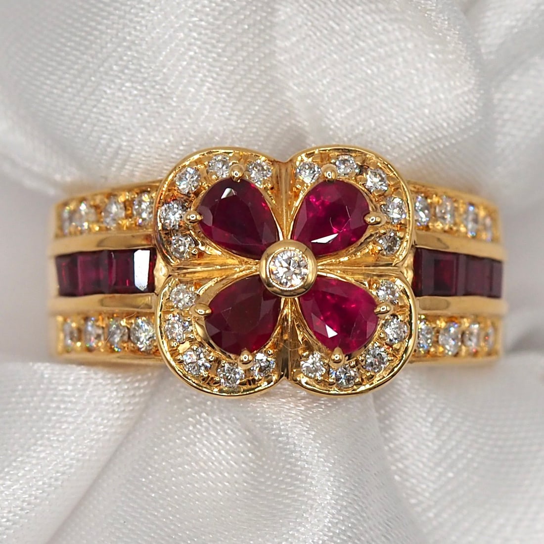 14k Gold 1.36 Ctw Natural Ruby & Ruby Ring: Ref:231098298 // gold content:14k gold // ring size:7. 25us // // main gemstone:ruby // shape:pear // carat weight:0. 6ct // color:red // treatment:natural // // adjacent gemstone 2 : ruby //