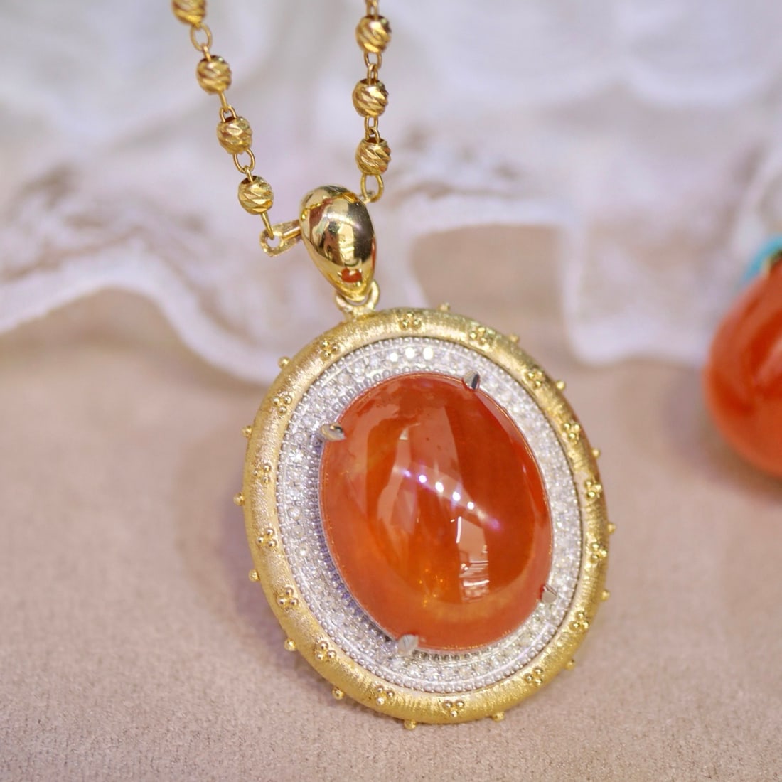 14k Gold 16.78 Ctw Natural Spessartine & Diamond Pendant( Without Chain ): Ref:231098400 // gold content:14k gold // main gemstone:spessartine // shape:oval // carat weight:16. 6ct // color:orange // treatment:natural // // adjacent gemstone 2 : diamond // shape:round //