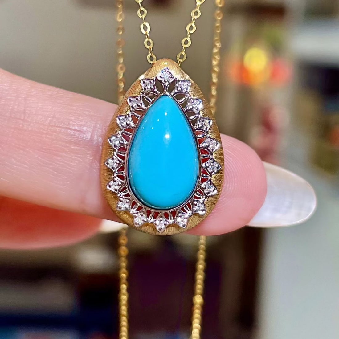 14k Gold 2.98 Ctw Natural Blue Turquoise & Diamond Pendant( Without Chain ): Ref:231098442 // gold content:14k gold // main gemstone:blue turquoise // shape:pear // carat weight:2. 91ct // color:blue // treatment:natural // // adjacent gemstone 2 : diamond // shape:round //