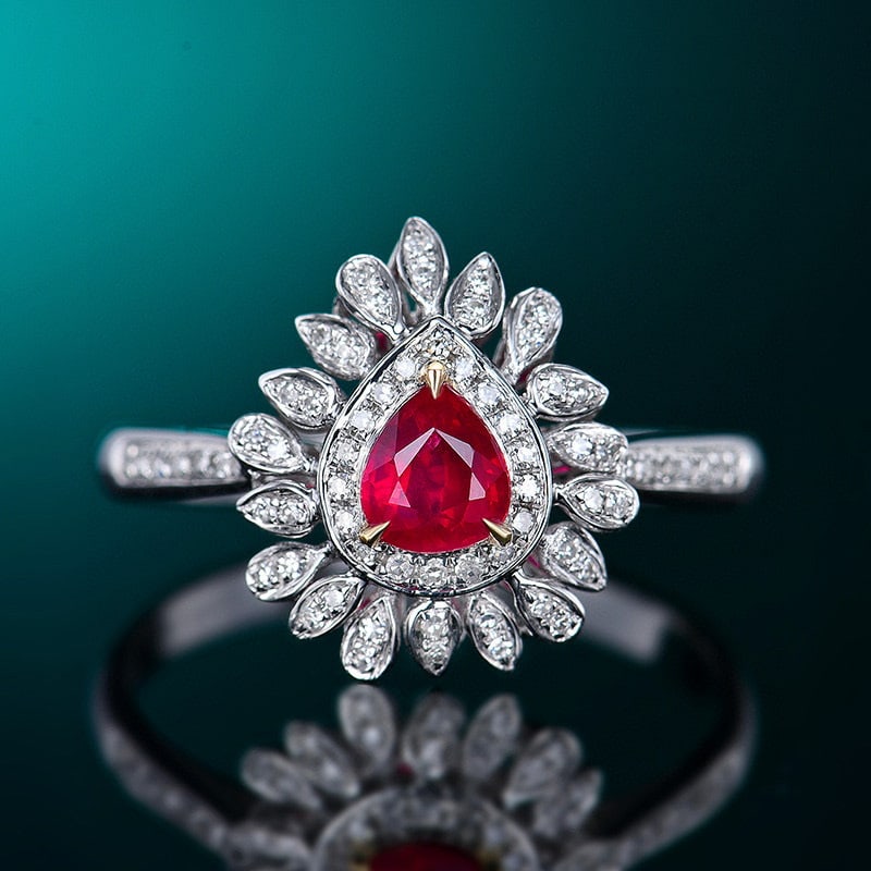 14k Gold 0.60 Ctw Natural Ruby & Diamond Ring: Ref:231099060 // gold content:14k gold // ring size:7. 25us // // main gemstone:ruby // shape:pear // carat weight:0. 44ct // color:pigeonblood red // treatment:natural // // adjacent gemstone 2 :