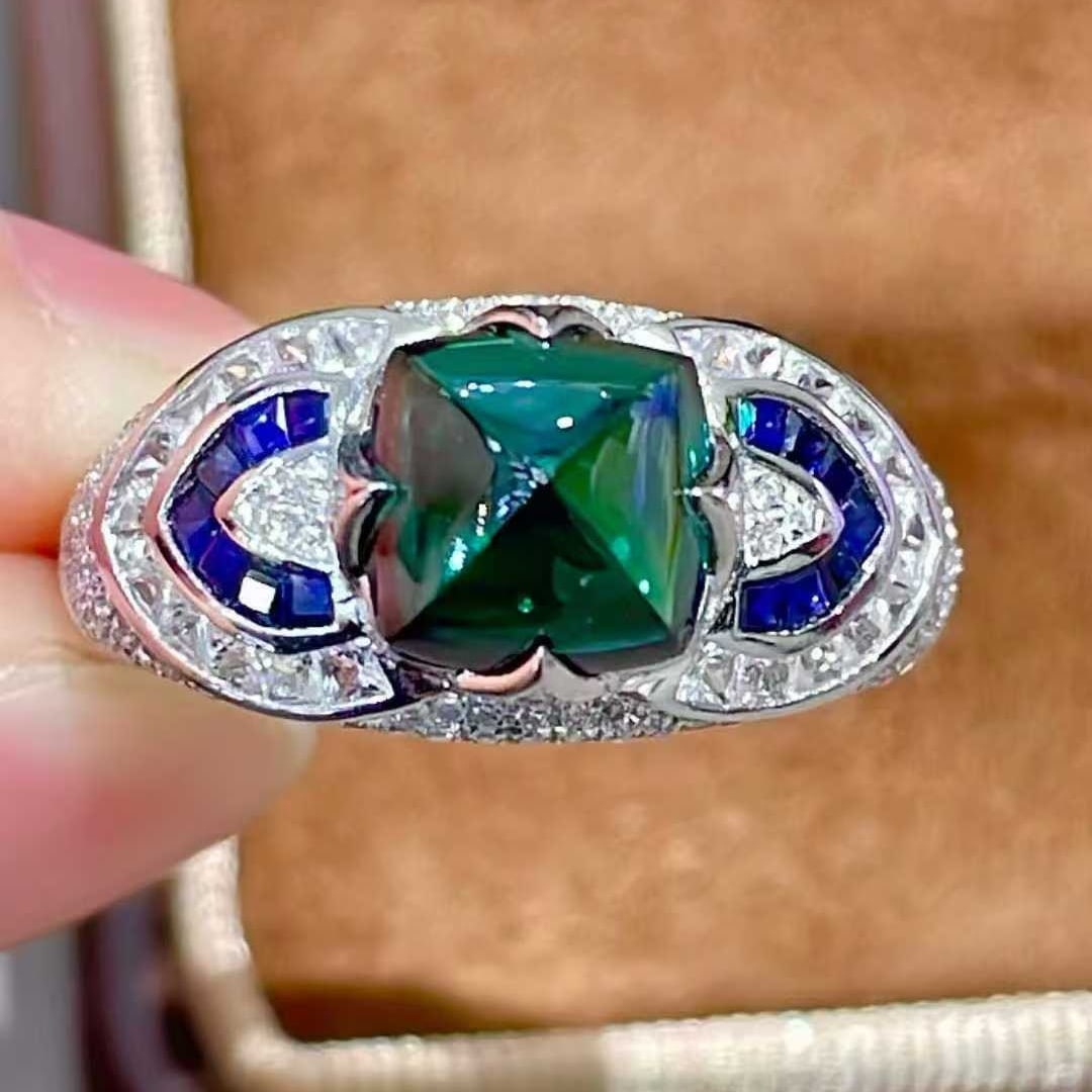 14k Gold 2.43 Ct Natural Tourmaline & Diamond & Sapphire Ring: Ref:231099133 // gold content:14k gold // ring size:7. 25us // // main gemstone:tourmaline // shape:sugar-loaf // carat weight:2. 43ct // color:green // treatment:natural // // adjacent gemstone 2 : d
