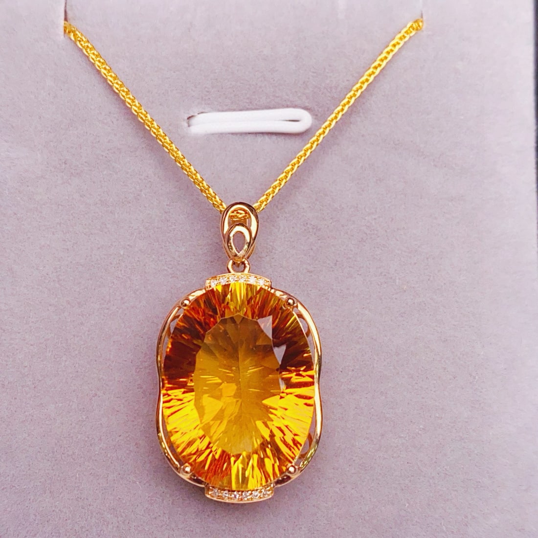 14k Gold 15.08 Ctw Natural Citrine & Diamond Pendant( Without Chain ): Ref:231099185 // gold content:14k gold // main gemstone:citrine // shape:oval // carat weight:15. 05ct // color:yellow // treatment:natural // // adjacent gemstone 2 : diamond // number of stones:12