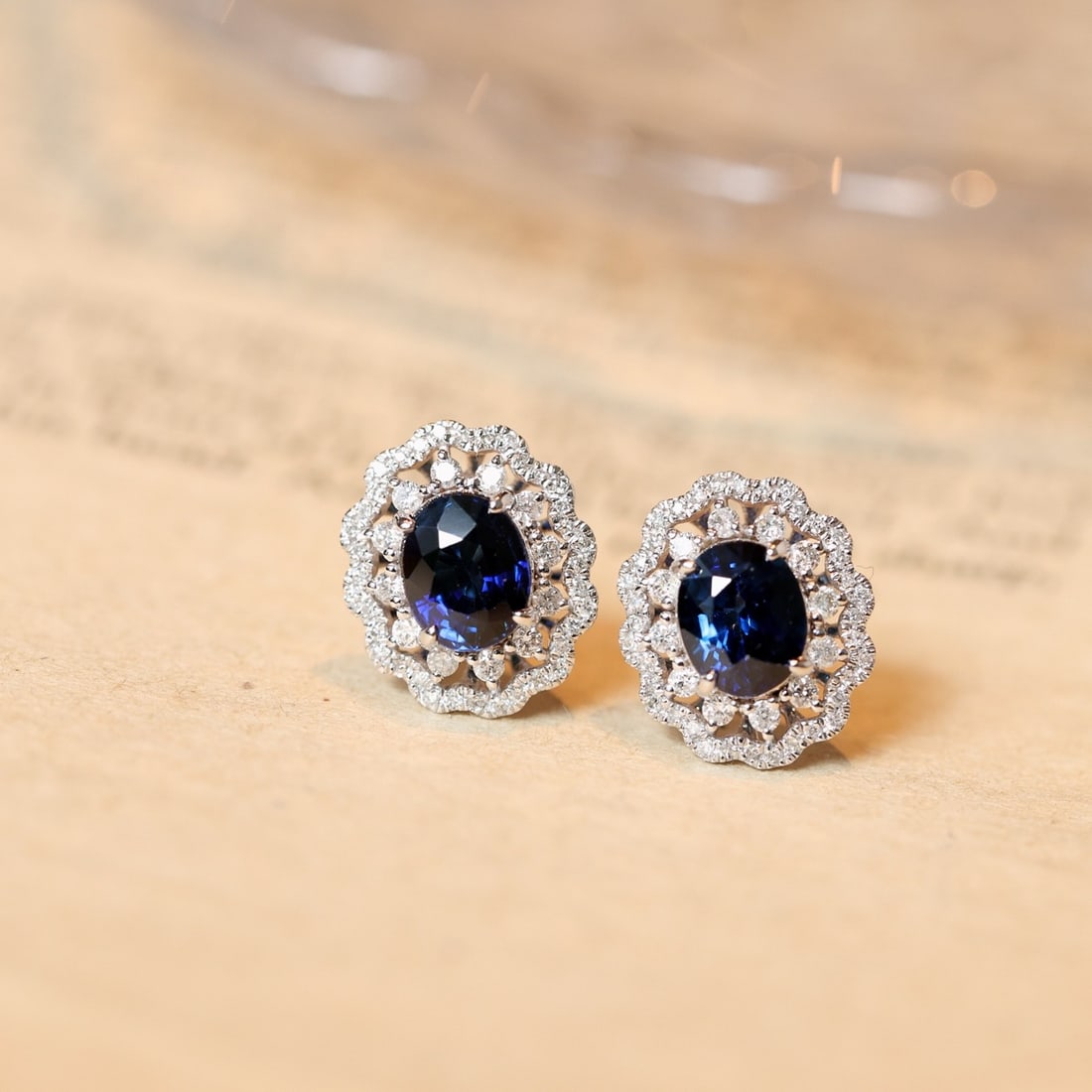 14k Gold 2.54 Ctw Natural Sapphire & Diamond Earrings: Ref:231100039 // gold content:14k gold // main gemstone:sapphire // shape:oval // carat weight:2. 08ct // color:blue // treatment:natural // // adjacent gemstone 2 : diamond // shape:round // carat