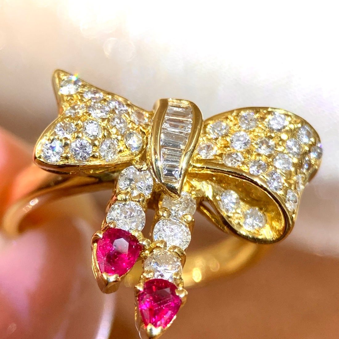 14k Gold 0.2 Ct Natural Ruby & Diamond Ring: Ref:231100113 // gold content:14k gold // ring size:7. 25us // // main gemstone:ruby // shape:pear // carat weight:0. 2ct // color:red // treatment:natural // // adjacent gemstone 2 : diamond //