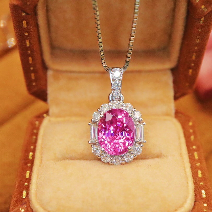 14k Gold 2.38 Ctw Natural Padparadscha Sapphire & Diamond Pendant( Without Chain ): Ref:231100117 // gold content:14k gold // main gemstone:padparadscha sapphire // shape:oval // carat weight:2. 06ct // color:orangish pink // treatment:natural // // adjacent gemstone 2 : diamond //