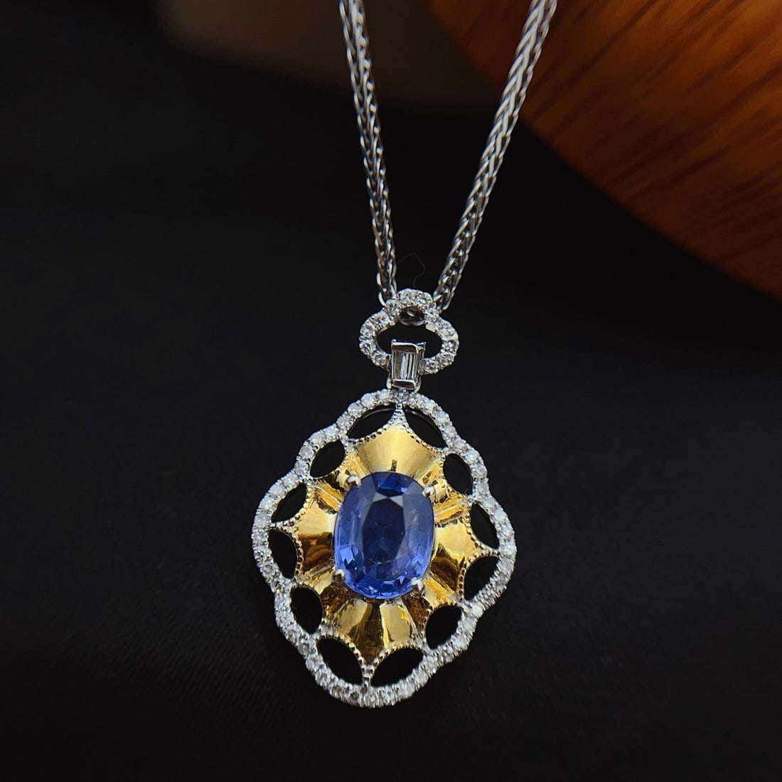 14k Gold 1.60 Ct Natural Sapphire & Diamond Pendant( Without Chain ): Ref:231100170 // gold content:14k gold // main gemstone:sapphire // shape:oval // carat weight:1. 60ct // color:blue // treatment:natural // // adjacent gemstone 2 : diamond // number of stones:66 //