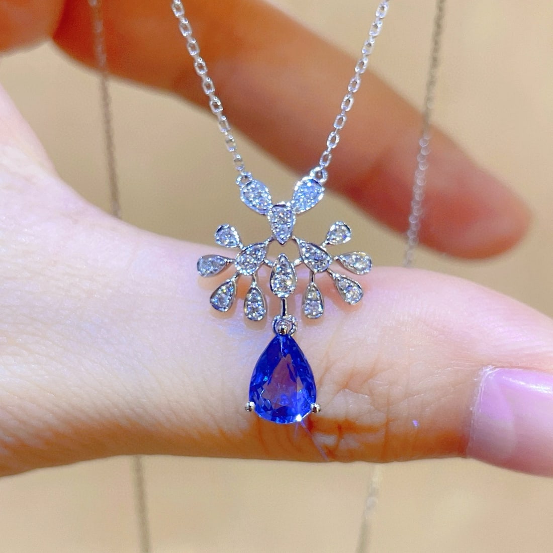 14k Gold 1.31 Ctw Natural Sapphire & Diamond Necklace: Ref:231100176 // gold content:14k gold // main gemstone:sapphire // shape:pear // carat weight:1. 13ct // color:blue // treatment:natural // // adjacent gemstone 2 : diamond // shape:round // carat