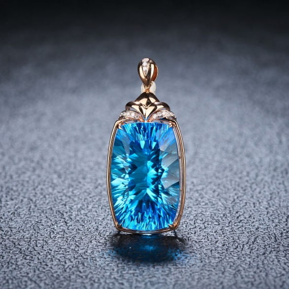 14k Gold 24.59 Ct Natural Topaz & Diamond Pendant( Without Chain ): Ref:231100272 // gold content:14k gold // main gemstone:topaz // shape:cushion // carat weight:24. 59ct // color:blue // treatment:natural // // adjacent gemstone 2 : diamond // shape:round //
