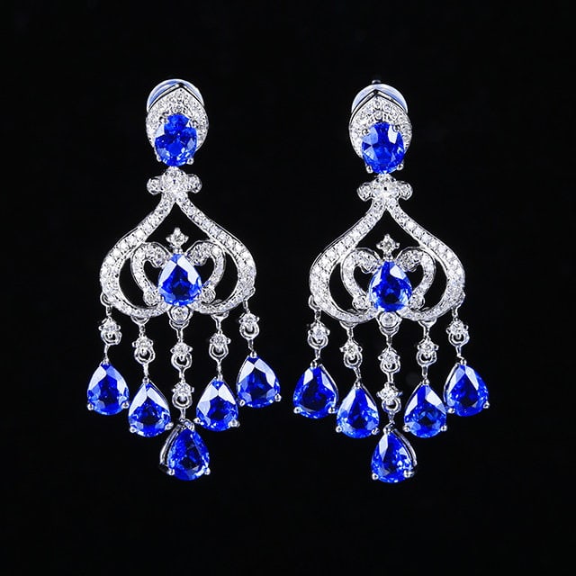 14k Gold 6.05 Ctw Natural Sapphire & Diamond Earrings: Ref:231101065 // gold content:14k gold // main gemstone:sapphire // shape:pear // carat weight:5. 42ct // color:blue // treatment:natural // // adjacent gemstone 2 : diamond // number of stones:170 //