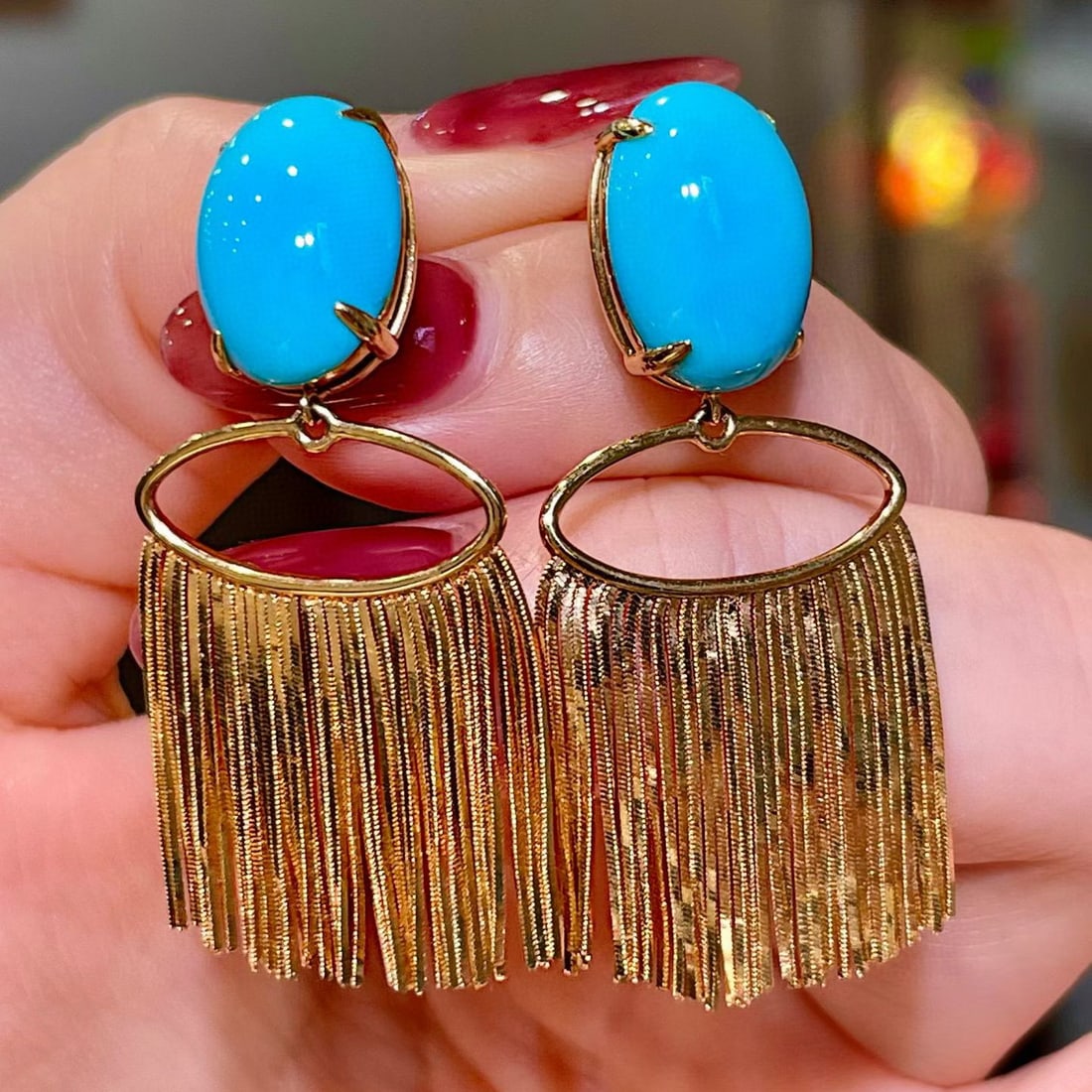 14k Gold 9.25 Ct Natural Blue Turquoise Earrings: Ref:231101087 // gold content:14k gold // main gemstone:blue turquoise // shape:oval // carat weight:9. 25ct // color:blue // treatment:natural // Condition: New Low Estimate: 7300.00 High Estimate: