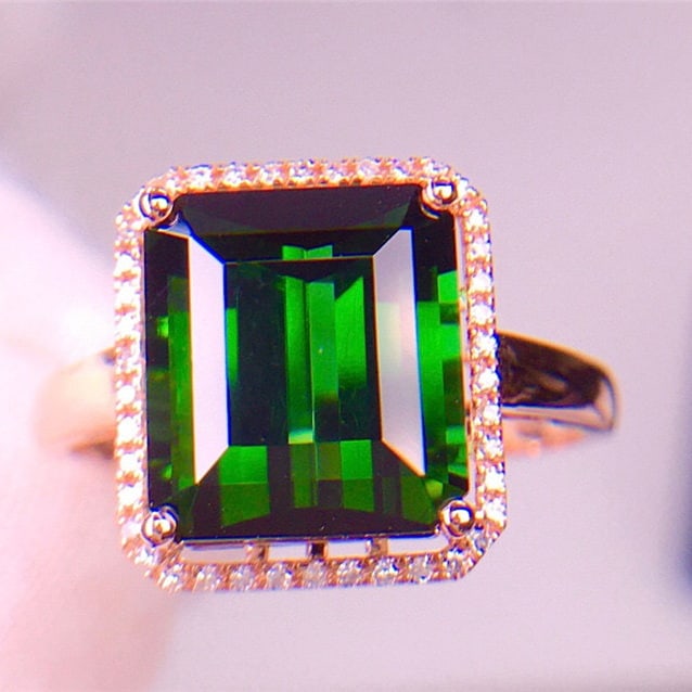 14k Gold 5.8 Ct Natural Tourmaline & Diamond Ring: Ref:231101129 // gold content:14k gold // ring size:7. 25us // // main gemstone:tourmaline // shape:octagonal // carat weight:5. 8ct // color:green // treatment:natural // // adjacent gemstone 2 :