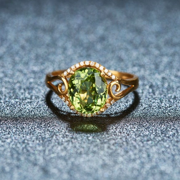 14k Gold 2.92 Ct Natural Tourmaline & Diamond Ring: Ref:231102003 // gold content:14k gold // ring size:7. 25us // // main gemstone:tourmaline // shape:oval // carat weight:2. 92ct // color:green // treatment:natural // // adjacent gemstone 2 :