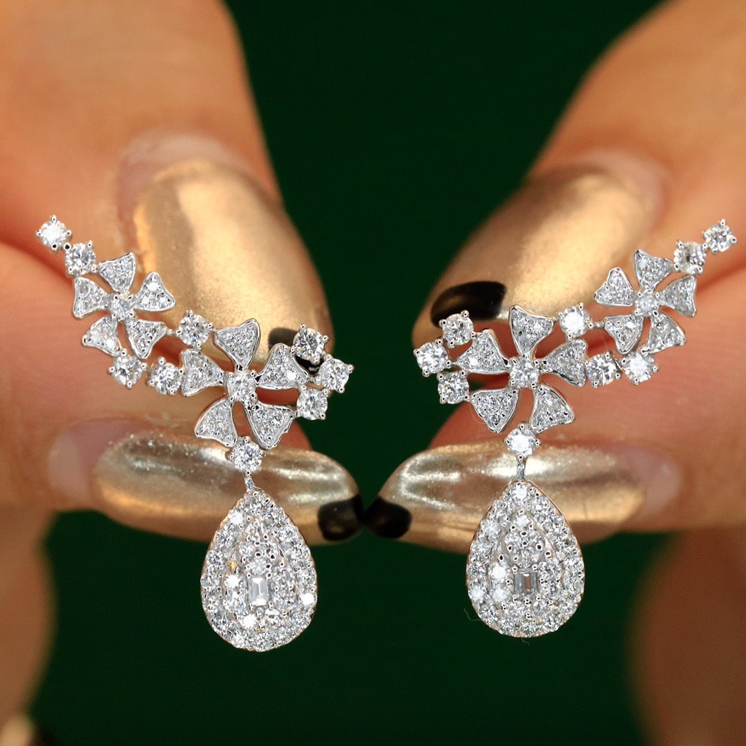 14k Gold 0.84 Ct Natural H Diamond Earrings: Ref:231102247 // gold content:14k gold // main gemstone:diamond // shape:multiple // carat weight:0. 84ct // clarity grade:vs-si // color:h // treatment:natural // Condition: New Low Estimate: