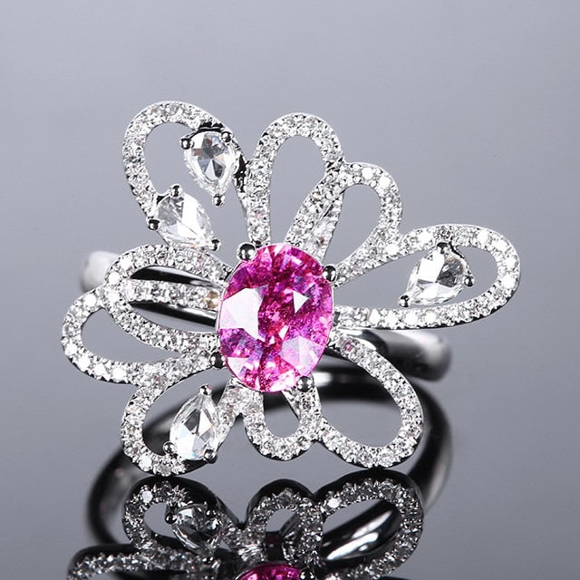 14k Gold 1.94 Ctw Natural Padparadscha Sapphire & Diamond Ring: Ref:231103065 // gold content:14k gold // ring size:7. 25us // // main gemstone:padparadscha sapphire // shape:oval // carat weight:1. 46ct // color:orangish pink // treatment:natural // // adjacent g