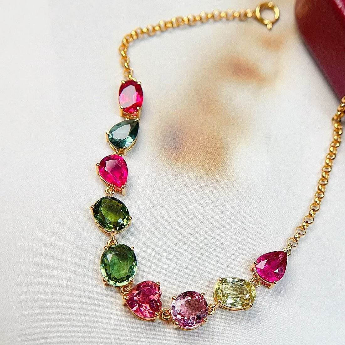 14k Gold 6.5 Ct Natural Tourmaline Bracelet: Ref:231103088 // gold content:14k gold // main gemstone:tourmaline // shape:multiple // carat weight:6. 5ct // color:color // treatment:natural // Condition: New Low Estimate: 3700.00 High Estimate: