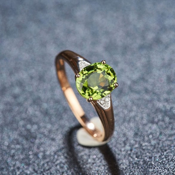 14k Gold 1.85 Ct Natural Tourmaline & Diamond Ring: Ref:231103092 // gold content:14k gold // ring size:7. 25us // // main gemstone:tourmaline // shape:oval // carat weight:1. 85ct // color:green // treatment:natural // // adjacent gemstone 2 :