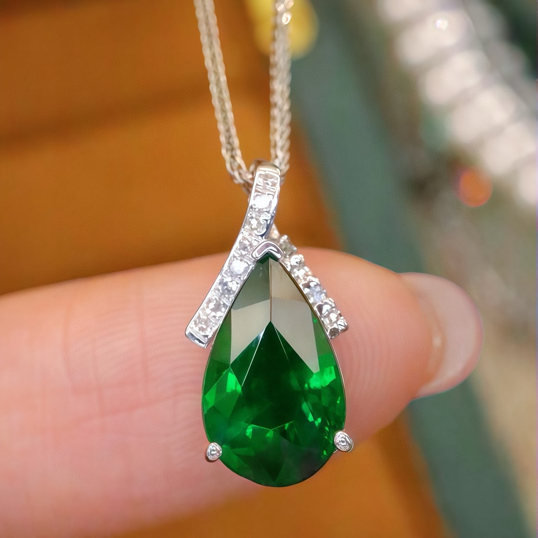 14k Gold 2.09 Ctw Vivid Green Natural Tsavorite & Diamond Pendant( Without Chain ): Ref:231103170 // gold content:14k gold // main gemstone:tsavorite // shape:pear // carat weight:2. 03ct // color:vivid green // treatment:natural // // adjacent gemstone 2 : diamond // number of