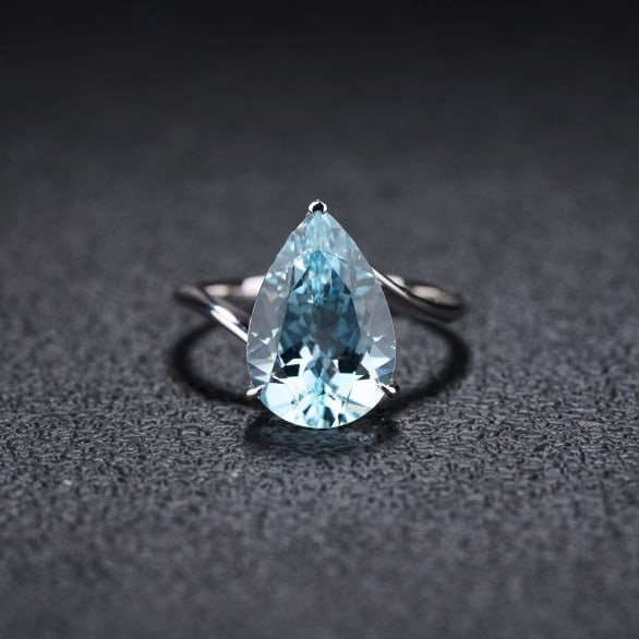 14k Gold 4.1 Ct Natural Aquamarine Ring: Ref:231103215 // gold content:14k gold // ring size:7. 25us // // main gemstone:aquamarine // shape:pear // carat weight:4. 1ct // color:santa maria color // treatment:natural // Condition: New Low
